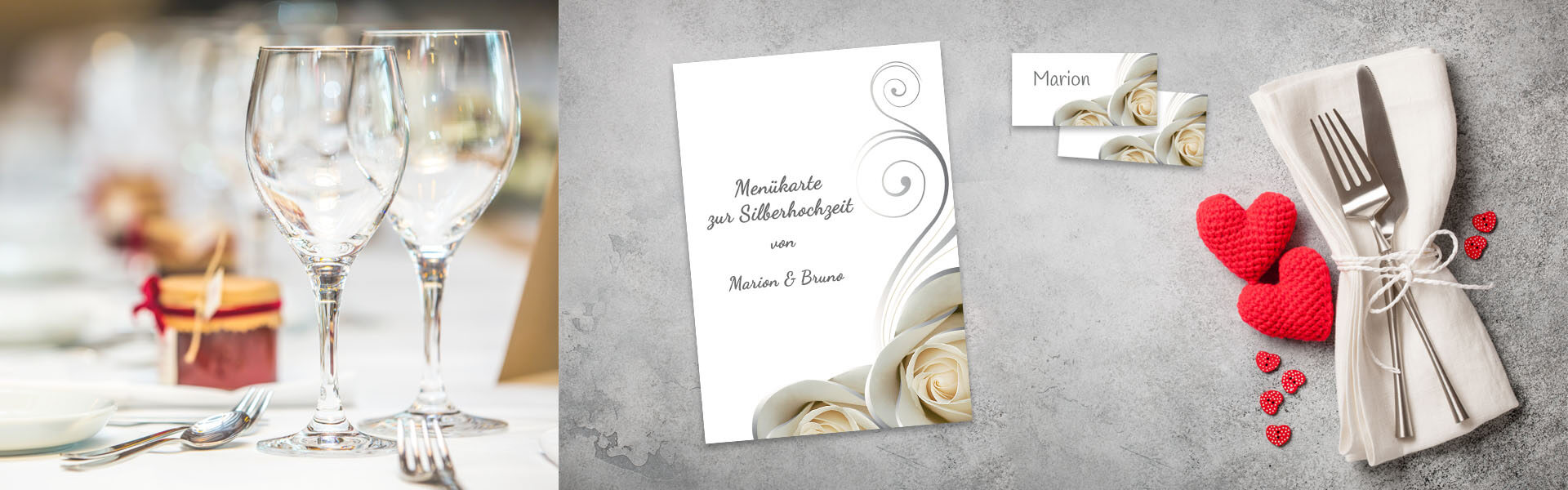 Tisch zur Silberhochzeit mit Menükarte silbernem Besteck auf einer Serviette und roten Herzen zur Dekoration